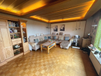 Einfamilienhaus mit Einliegerwohnung und traumhafter Aussicht in Althütte - Wohnzimmer EG