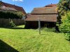 "Ehemaliges Bauernhaus mit integrierter Scheune in Schorndorf" - Garten mit Gartenhaus