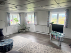 Vielseitiges Haus in Grünenbach – saniert, mit 3 Wohnungen, Ausbaupotenzial & Vermietungschance! - Wohnzimmer OG