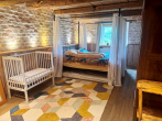 Vielseitiges Haus in Grünenbach – saniert, mit 3 Wohnungen, Ausbaupotenzial & Vermietungschance! - Schlafzimmer EG